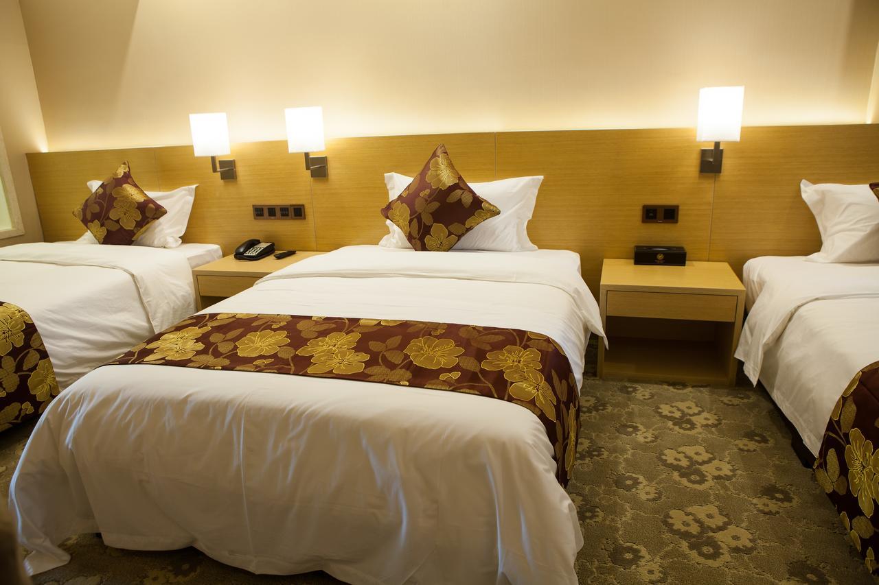Guangzhou Wan Ao Hotel Plaza Limited Airport Express Hotel Номер фото